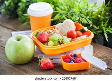 Lunch Box For Kids With Sandwich, Cookies, Fresh Veggies And Fruits