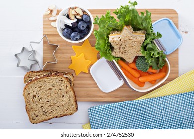 Lunch Box With Sandwich, Carrots And Salad