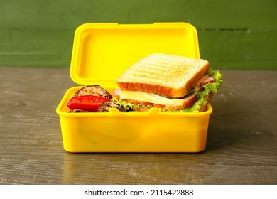 Lunch Box With Tasty Food On Table