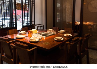 Lunch Break In The Empty Hot Pot Restaurant Table And Chair