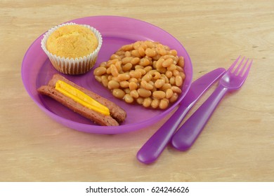 Lunch Of Hot Dog, Beans And Corn Muffin Om Plastic Picnic Plate