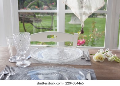 Lunch Set Table In A Bay Window