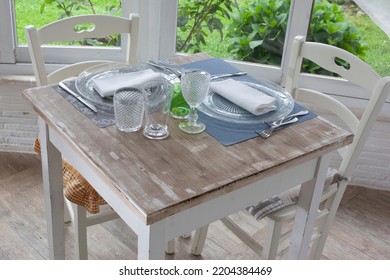 Lunch Set Table In A Bay Window