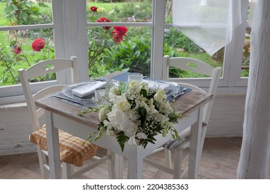 Lunch Set Table In A Bay Window