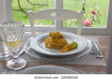 Lunch Set Table In A Bay Window With Zucchini Floers Spaghetti