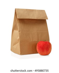 Lunch Time. Closeup Of Brown Paper Lunch Bag,red Apple  Isolated On White.