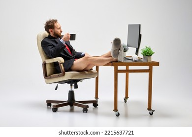 Lunch Time. Young Business Man Sitting At Home And Taking Part At Online Meeting With Co-workers. Business, Studying, Education, Youth, Remote Workplace Concept.Copy Space For Text