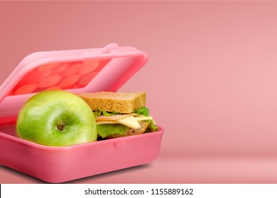 Lunchbox With An Apple And Sandwich