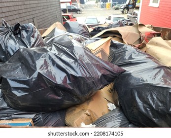 Lunenburg, NS, CAN, Sept 12th, 2022 - An Overflowing Dumpster Full Of Trash.