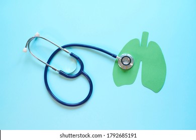 Lung health therapy medical concept . silhouette of the lungs and a stethoscope on a blue background. concept of respiratory disease, pneumonia, tuberculosis, bronchitis, asthma, lung abscess