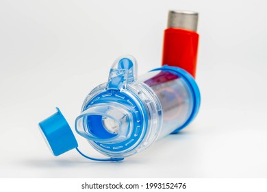 Lung Medication With Corticosteroids For Asthma Or COPD. An Inhaler With Spacer With White Background.