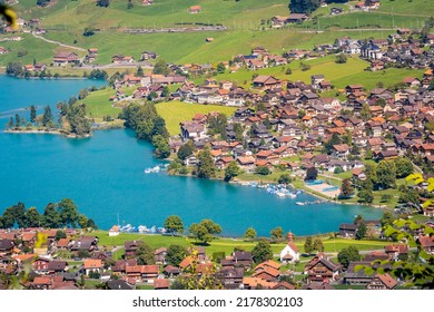 Lungern turquoise lake and village , canton of Obwalden in Switzerland