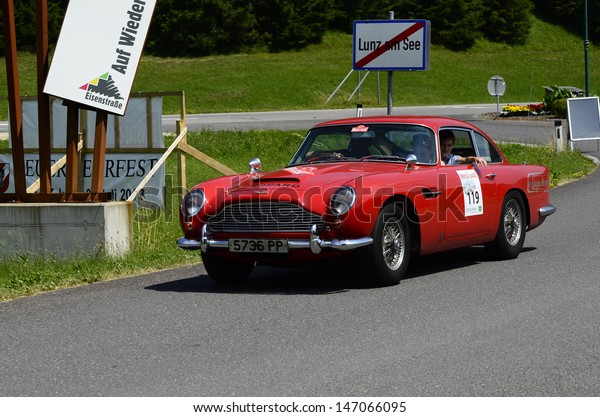 LUNZ, AUSTRIA - JULY 19: Aston Martin DB5 on\
special stage by International Ennstal Classic 2013, a yearly\
tournament through Austria for vintage cars on July 19, 2013, in\
Lunz am See, Austria