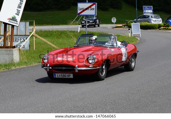 LUNZ, AUSTRIA - JULY 19: Jaguar E-Type on special\
stage by International Ennstal Classic 2013, a yearly tournament\
through Austria for vintage cars on July 19, 2013, in Lunz am See,\
Austria