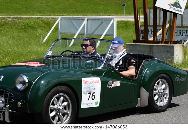LUNZ, AUSTRIA - JULY 19: Triumph TR3 on special\
stage by International Ennstal Classic 2013, a yearly tournament\
through Austria for vintage cars on July 19, 2013, in Lunz am See,\
Austria