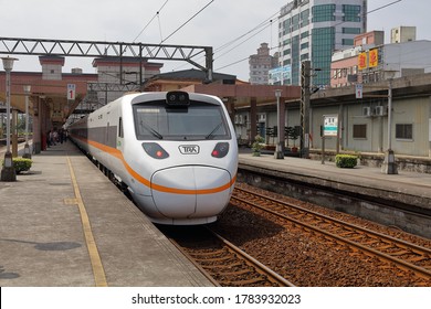 Luodong Township, Yilan County , Taiwan - Jan 15th ,2018 : Taroko Express Train Is Coming Pass Luodong  Train Station 