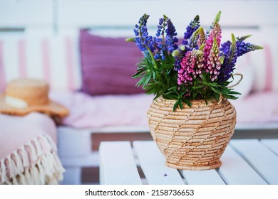 Lupine Flower Bouqet On The Wooden Pallet Furniture At Summer Patio