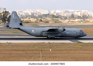Luqa, Malta - September 28, 2021: Tunisian Air Force Lockheed Martin C-130J-30 Hercules (L-382) (Reg.: Z21122) landing runway 31 to pick up some cargo.