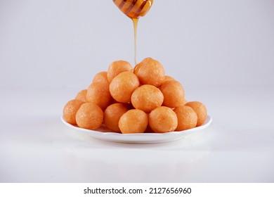 Luqaimat with honey oriental food