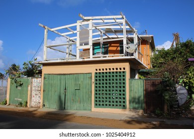 Luquillo Puerto Rico - February 12, 2018: A Home Shows Damage From Hurricanes Irma And Maria In February 2018 In Luquillo Puerto Rico.