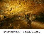 Luray Caverns,VA. Yellow backdrop. Stone texture. Usa travel.