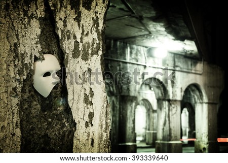 Lurking in the Shadows - Phantom of the Opera Mask in Dark Tunnel