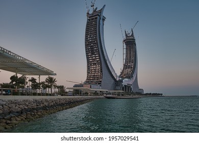 Lusail City, Qatar- March 30 2021:  Katara Towers Project In Lusail Marina Daylight View .Construction Industry Concept.