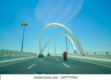 Lusail Expressway Memorial Arches Large White Structure Crossing A Highway Interchange In Doha Qatar.