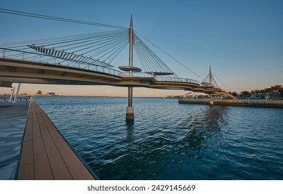 The Lusail Pedestrian Bridges, also  known as the Glass Bridge of Lusail, Lusail city, Qatar is a suspension bridge that runs across Qetaifan Island South 1, 2 and 3.  - Powered by Shutterstock