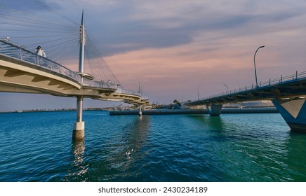 The Lusail Pedestrian Bridges, also  known as the Glass Bridge of Lusail, Lusail city, Qatar is a suspension bridge that runs across Qetaifan Island South 1, 2 and 3.  - Powered by Shutterstock