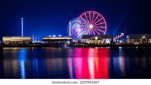 Lusail, Qatar - December 01, 2022: Ferris wheel, Lusail Winter Wonderland outdoor amusement park in Al Maha Island Night View - Shutterstock ID 2259441067