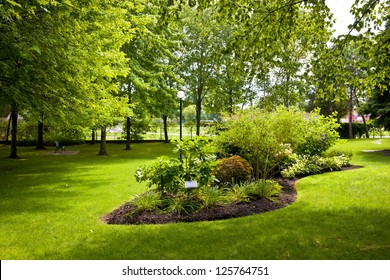 Lush landscaped grounds with garden in city park