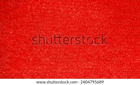 Lust red color floormat, carpet texture or towel fabric texture background for seamless design or studio backdrop. Nice 4k high regulation image.