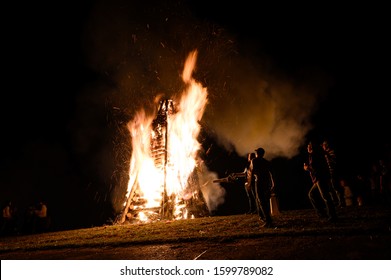 Lutcher, LA / United States - 12 24 2019: Annual Christmas Bonfires A Cajun Tradition Along Mississippi River Levee Guiding Papa Noel