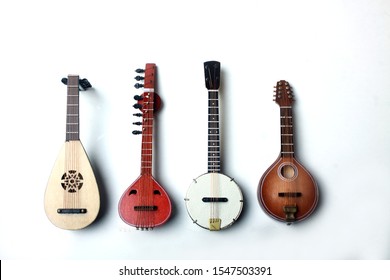 Lute, Mandoline, Banjo And Sitar Isolated On White Background