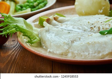 Lutefisk,  traditional dish of some Nordic countries, Norwegian  cuisine,  Traditional assorted dishes, Top view.