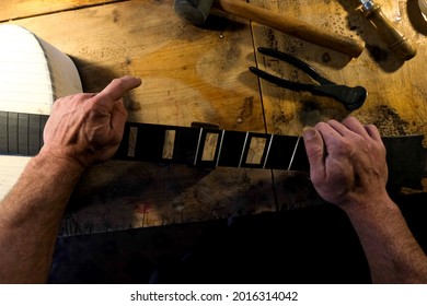 Luthier's workshop where luthier use many tools to works for create a new guitar