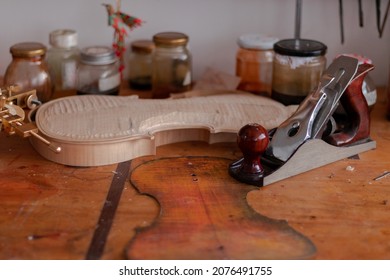 Luthier's workshop where luthier use many tools to create a new violin