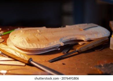 Luthier's workshop where luthier use many tools to create a new violin