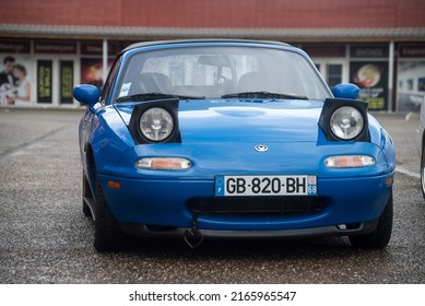Lutterbach - France - 5 June 2022 - Front view of vintage Mazda MX5 parked in the street