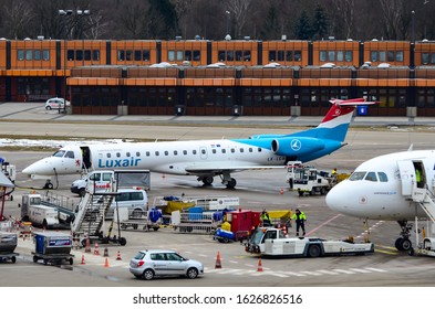 Luxair Embraer ERJ-145LU, Registration LX-LGW, Manufacturer Serial Number (MSN): 145135, Is Parked At The Berlin Tegel 