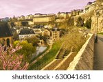 Luxembourg city street and river Alzette Grand Duchy cascade of buildings Morning sunlight Fresh spring view to the town centre and park Empty streets beautiful day purple sky 2017