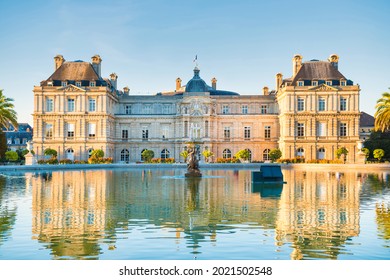 Luxembourg Garden With Pond, Fountaine And Building Of Luxembourg Palace With No People. Paris, France