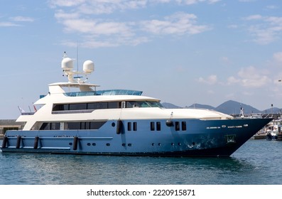 A Luxery Yacht Entering The Harbour