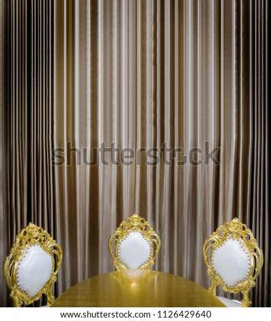 luxuary golden table and seat decoration in dining room - use for background