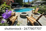Luxurious Backyard Pool with Fire Pit and Outdoor Bar