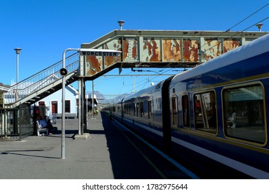 The Luxurious Blue Train In Contrast With The Rural Station In Worcester In The Karoo, South Africa