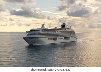 Luxurious crew ship sailing in the open waters  - Powered by Shutterstock