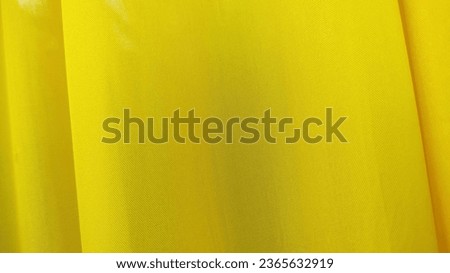 Luxurious fabric, wavy folds of thin nylon or satin material, abstract background