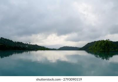  Luxurious infinity pool overlooking the dense tropical green mountains and valley of Vagamon hill station, Kerala, India.